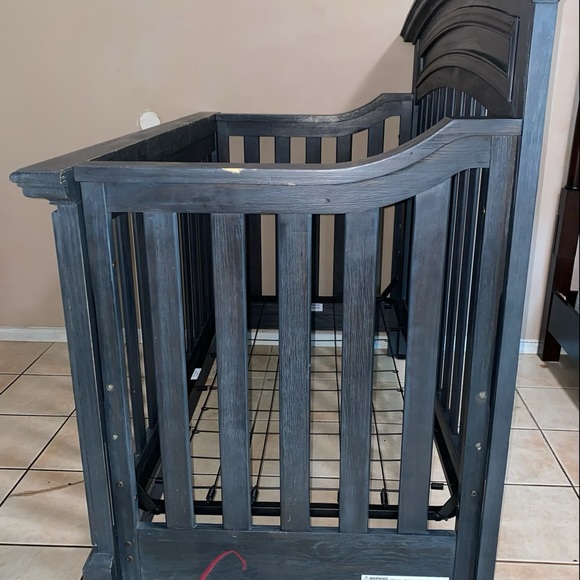 This antique crib upsizes. Transforms to a regular bed - Picture 3 of 4